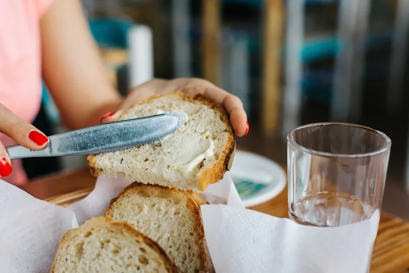 Bread with butter on the table